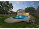 Backyard view of the pool at 208 Se Lincoln N Cir, St Petersburg, FL 33703
