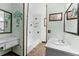 Bathroom featuring tiled floors, vanity, mirror, and tub at 208 Se Lincoln N Cir, St Petersburg, FL 33703