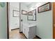 Bathroom featuring tiled floors, mirror and vanity at 208 Se Lincoln N Cir, St Petersburg, FL 33703