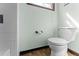 Bathroom with toilet and tiled shower at 208 Se Lincoln N Cir, St Petersburg, FL 33703