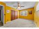 This empty bedroom features two windows and a closet at 208 Se Lincoln N Cir, St Petersburg, FL 33703