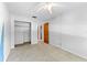 Empty bedroom showing closet at 208 Se Lincoln N Cir, St Petersburg, FL 33703