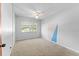 Bedroom featuring neutral walls and carpet at 208 Se Lincoln N Cir, St Petersburg, FL 33703
