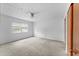 Unfurnished bedroom featuring neutral walls, ceiling fan, and a closet at 208 Se Lincoln N Cir, St Petersburg, FL 33703