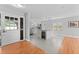 Bright kitchen featuring stainless steel appliances, a center island with bar seating, and ample counter space at 208 Se Lincoln N Cir, St Petersburg, FL 33703