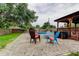 Spacious outdoor seating area near a pool, offering an ideal space for relaxation and recreation at 2192 Robinson Dr, St Petersburg, FL 33710