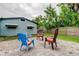 Home backyard featuring a brick patio and lush greenery provides a tranquil outdoor retreat at 2192 Robinson Dr, St Petersburg, FL 33710