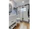 Well-lit bathroom with a modern sink and shower with glass doors at 2192 Robinson Dr, St Petersburg, FL 33710