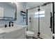 Bathroom featuring modern sink, black fixtures and a glass shower at 2192 Robinson Dr, St Petersburg, FL 33710