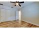 Bedroom with wood-look flooring and neutral walls, offering a modern aesthetic at 2192 Robinson Dr, St Petersburg, FL 33710