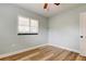 This light and airy bedroom offers wood floors and neutral walls for a comfortable space at 2192 Robinson Dr, St Petersburg, FL 33710