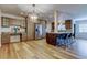 Spacious kitchen featuring stainless steel appliances, light wood floors and wooden cabinets at 2192 Robinson Dr, St Petersburg, FL 33710