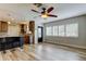 Open-concept kitchen and living room with hardwood floors, abundant natural light, and stylish finishes at 2192 Robinson Dr, St Petersburg, FL 33710