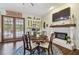 Comfortable breakfast area with adjacent coffee bar and fireplace for relaxing moments at 2513 Martucci Rd, Seffner, FL 33584
