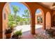 Arched columns frame the landscape creating an inviting outdoor space to relax and enjoy the scenery at 2513 Martucci Rd, Seffner, FL 33584