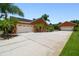 Spacious garages offer ample parking and storage; the driveway has a unique paved design at 2513 Martucci Rd, Seffner, FL 33584