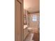 Cozy bathroom with shower-tub, white vanity, and neutral decor at 29524 Waggle Dr, San Antonio, FL 33576