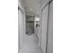 Contemporary bathroom featuring a glass shower, double sink vanity, and modern finishes at 29524 Waggle Dr, San Antonio, FL 33576