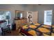 Airy bedroom featuring a decorative quilt and a view through the door to the en suite bathroom at 29524 Waggle Dr, San Antonio, FL 33576