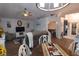 The living room has an open design with a ceiling fan and views of other rooms at 29524 Waggle Dr, San Antonio, FL 33576