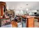 Spacious home bar with full shelving, sink, and refrigeration at 36251 Horseshoe Dr, Zephyrhills, FL 33541