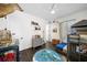 Bright bedroom featuring stylish decor, wood floors, and a ceiling fan at 4525 W Swann Ave, Tampa, FL 33609