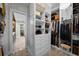 Spacious walk-in closet with custom shelves and drawers for ample storage space at 4525 W Swann Ave, Tampa, FL 33609