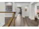 Hallway with wood and stainless steel railings at 4525 W Swann Ave, Tampa, FL 33609
