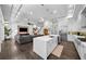 Open-concept kitchen featuring a large island, modern appliances, and seamless flow to the living area at 4525 W Swann Ave, Tampa, FL 33609