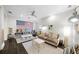 Bright and airy living room with an American flag mural, comfortable seating, and ample natural light at 4525 W Swann Ave, Tampa, FL 33609