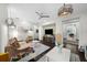 Comfortable living room featuring neutral tones, decorative lighting, and entertainment area at 4525 W Swann Ave, Tampa, FL 33609