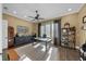 Spacious home office with a large window, custom shelving, and neutral colors for a comfortable workspace at 4525 W Swann Ave, Tampa, FL 33609