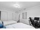 Cozy bedroom featuring two twin beds, neutral decor, and closet space at 4741 76Th N Ave, Pinellas Park, FL 33781