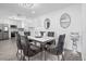 Elegant dining area with a modern table setting, stylish chairs, and contemporary decor in an open layout at 4741 76Th N Ave, Pinellas Park, FL 33781