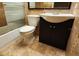 Bathroom features a toilet, sink, and mirror at 4811 Puritan Cir # 4811, Tampa, FL 33617
