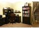 Office area with shelves, desk, and chair at 4811 Puritan Cir # 4811, Tampa, FL 33617