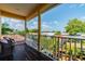 A large balcony offers seating and views of the surrounding lush landscaping at 539 Treviso Dr, Apollo Beach, FL 33572