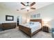 Bedroom featuring a comfortable bed, dresser, and nightstand creating a cozy retreat at 539 Treviso Dr, Apollo Beach, FL 33572
