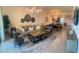 Open-concept living room flows into kitchen and dining area, features stylish decor and plenty of space at 5720 Palmer Cir # 102, Bradenton, FL 34211
