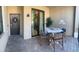 Charming patio with stone pavers, a dining table, and stylish decorations providing an inviting outdoor space at 5720 Palmer Cir # 102, Bradenton, FL 34211