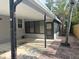 The home has a convenient covered carport with a brick walkway along the side of the home at 6427 2Nd S Ave, St Petersburg, FL 33707