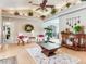 Inviting living room featuring hardwood floors and decorative accents at 702 Plumbrook Rd, Sun City Center, FL 33573