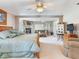 Large main bedroom with fireplace, sitting area, and ample natural light at 702 Plumbrook Rd, Sun City Center, FL 33573