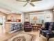 Cozy sitting area open to kitchen offers lots of space at 702 Plumbrook Rd, Sun City Center, FL 33573