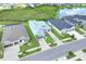 Aerial view showcasing the home's location near a pond and green space, nestled within a well-planned community at 7201 Talamore Dr, Wesley Chapel, FL 33545