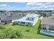 Aerial view of the home's backyard, highlighting the landscaping and outdoor space within the community at 7201 Talamore Dr, Wesley Chapel, FL 33545