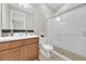 Well-lit bathroom featuring a stylish vanity and a glass enclosed shower at 7201 Talamore Dr, Wesley Chapel, FL 33545