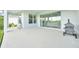 Covered patio perfect for outdoor entertaining, with large sliding doors and peaceful views at 7201 Talamore Dr, Wesley Chapel, FL 33545