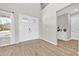 Inviting foyer with high ceilings, hardwood floors, and bright natural light at 7201 Talamore Dr, Wesley Chapel, FL 33545