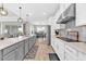 Modern kitchen equipped with stainless steel appliances, an island, and plenty of countertop space at 7201 Talamore Dr, Wesley Chapel, FL 33545